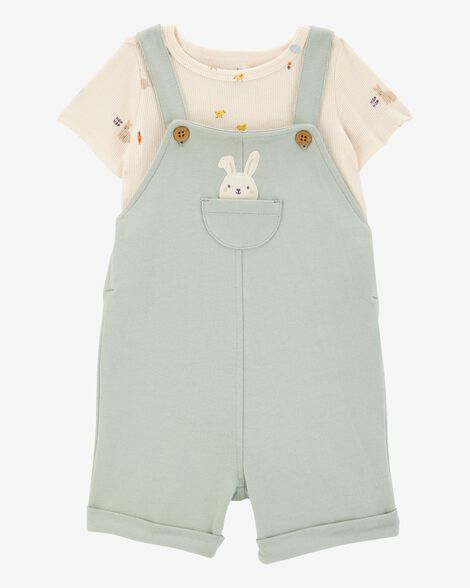 A set of green baby shortalls
