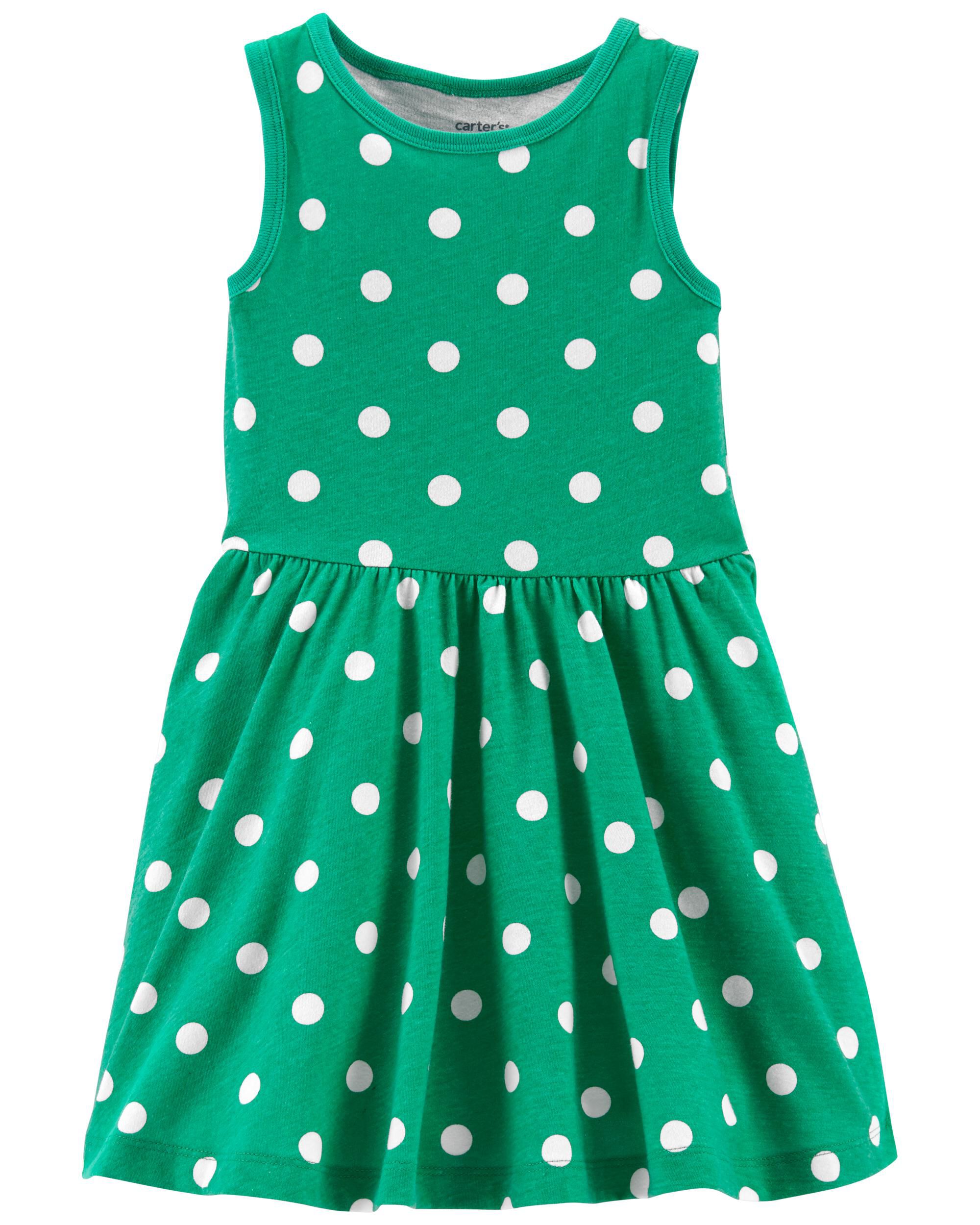 green dress with white polka dots