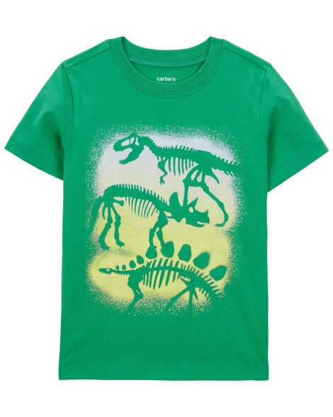A green shirt with dinosaurs on it