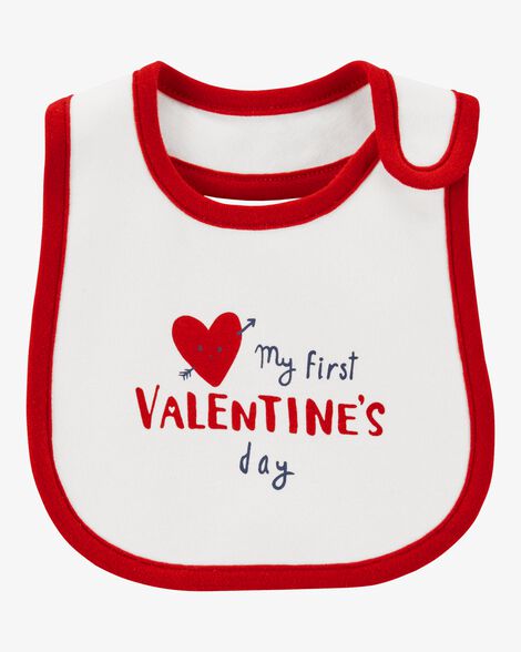 A white and red Valentine’s Day baby bib