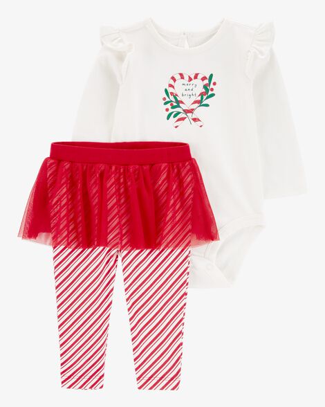 A white bodysuit with a candy cane graphic and white and red striped pants with a red tutu for babies