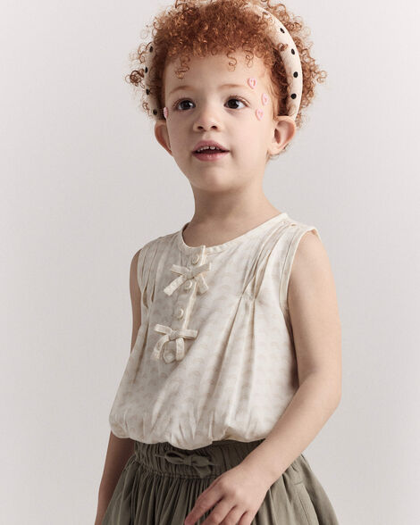 Toddler Girl Sleeveless Bow Top in Rainbow Print - Cream