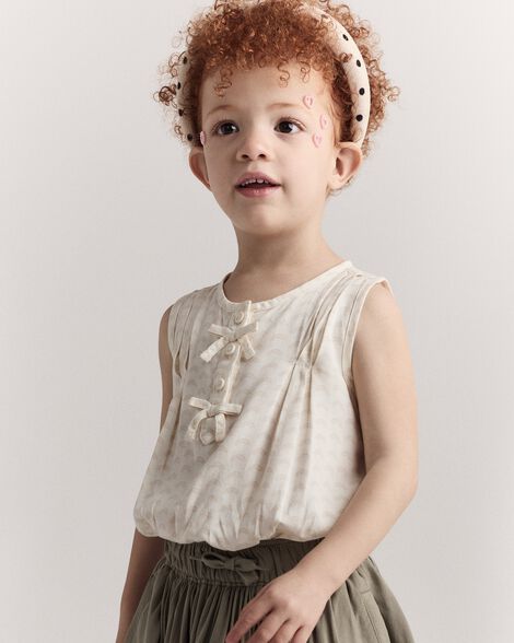 Toddler Girl Sleeveless Bow Top in Rainbow Print - Cream